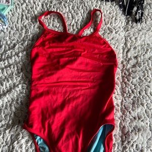 Red one piece suit